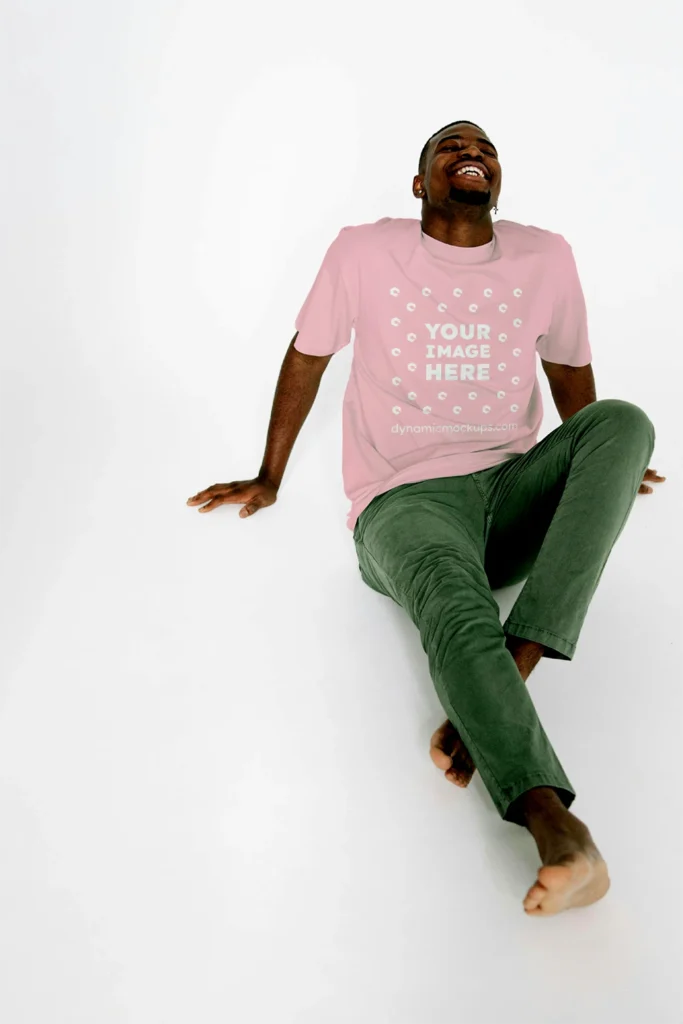 Man Wearing Pink T-shirt Mockup Front View Template