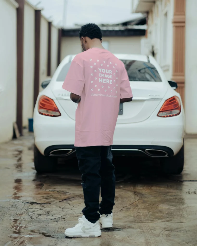 Man Wearing Pink T-shirt Mockup Back View Template