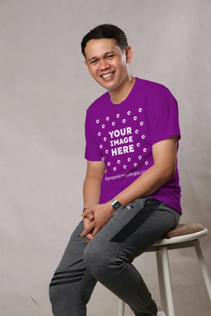 Man Wearing Purple T-shirt Mockup Front View Template