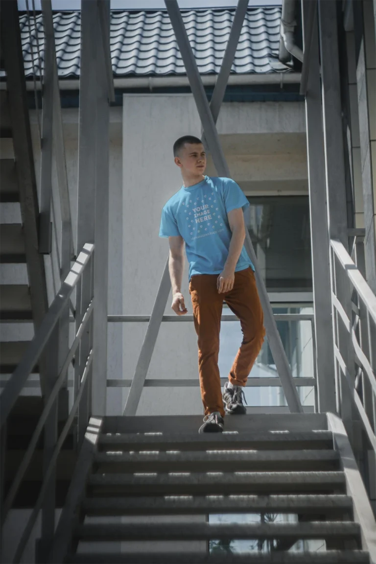 Man Wearing Sky Blue T-shirt Mockup Front View Template