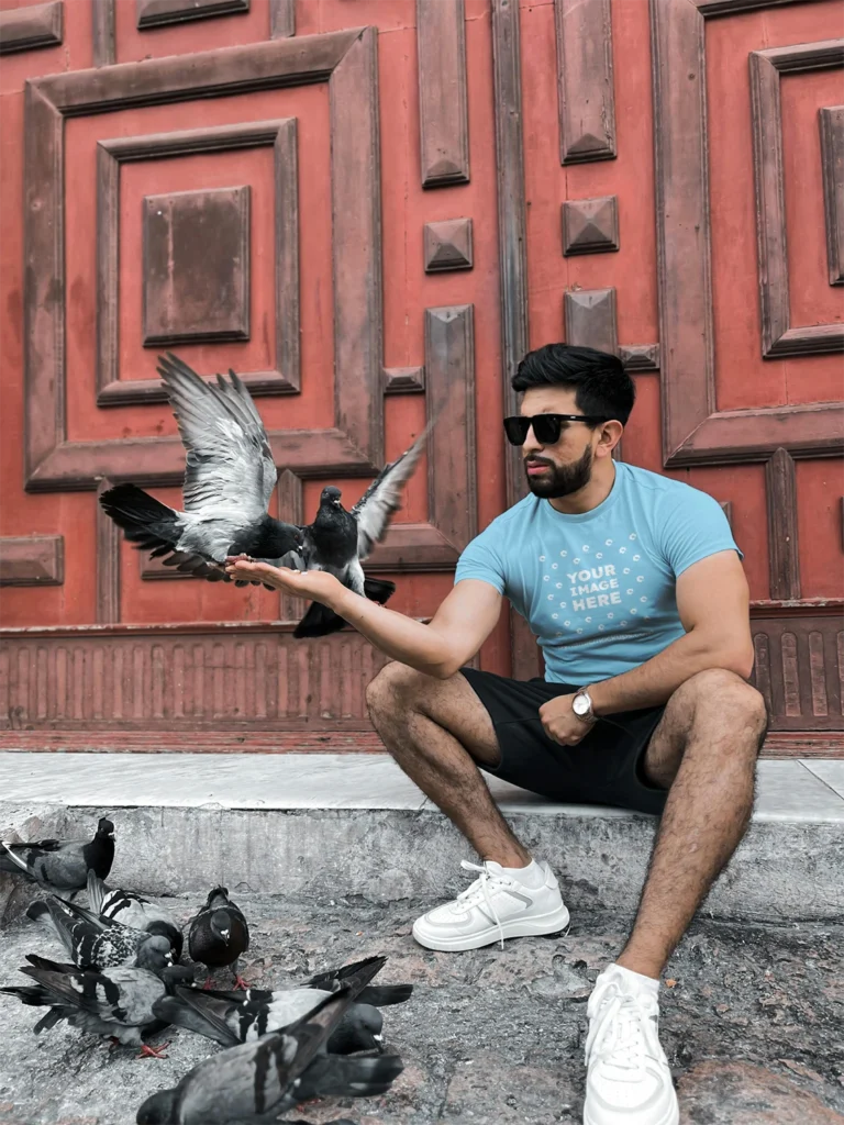 Man Wearing Sky Blue T-shirt Mockup Front View Template