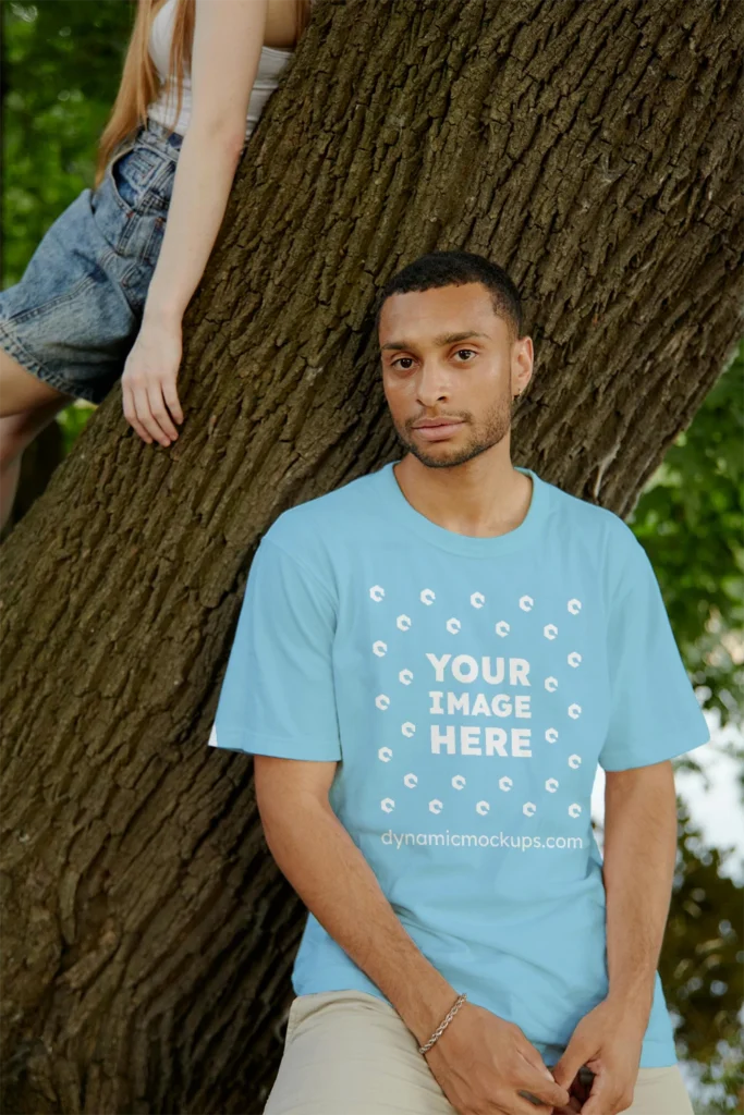 Man Wearing Sky Blue T-shirt Mockup Front View Template