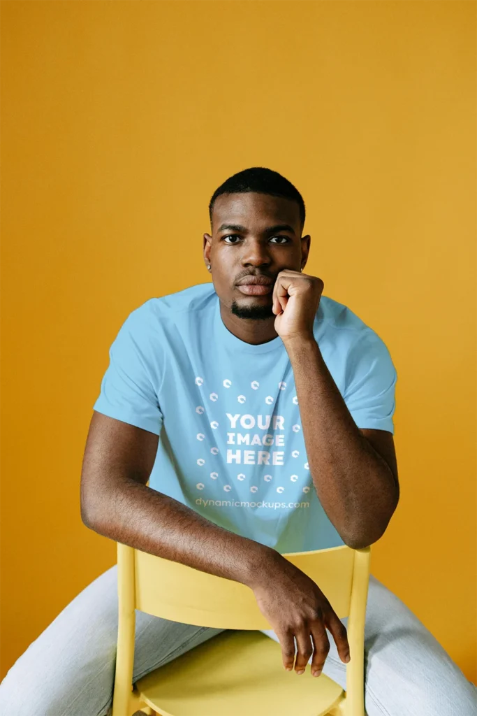 Man Wearing Sky Blue T-shirt Mockup Front View Template