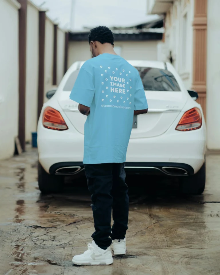 Man Wearing Sky Blue T-shirt Mockup Back View Template