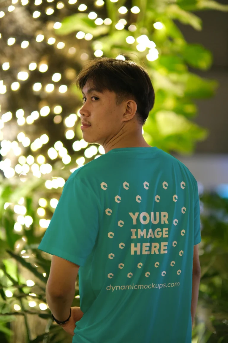 Man Wearing Teal T-shirt Mockup Back View Template