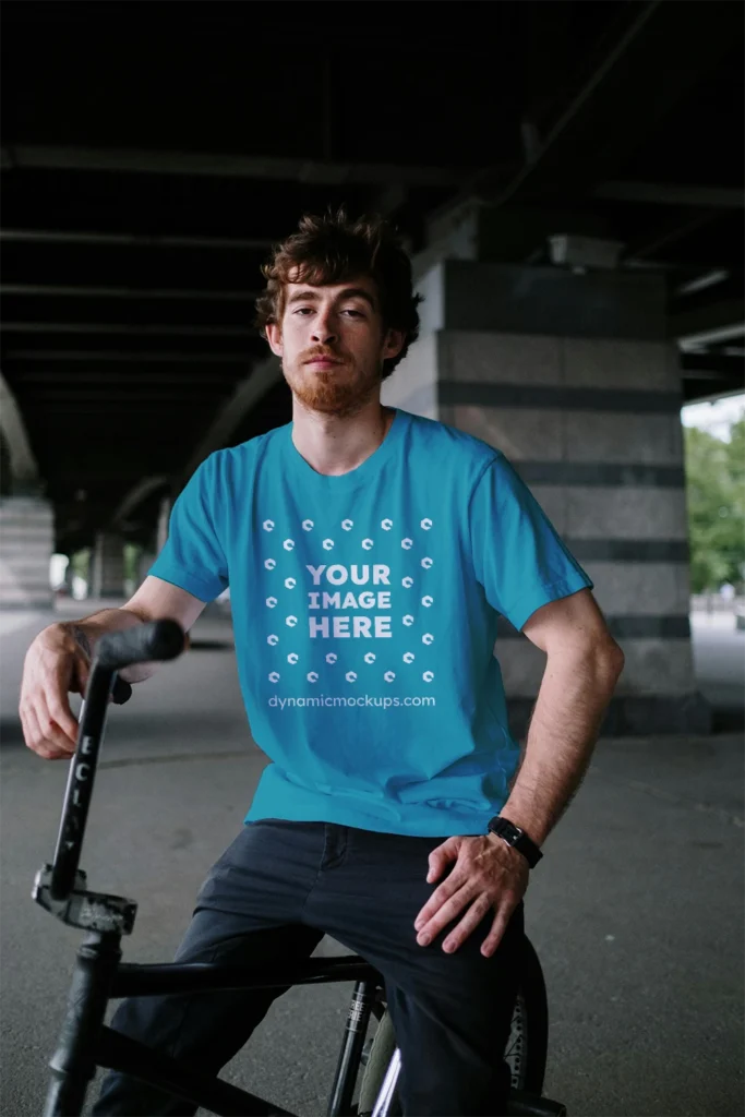 Man Wearing Teal T-shirt Mockup Front View Template