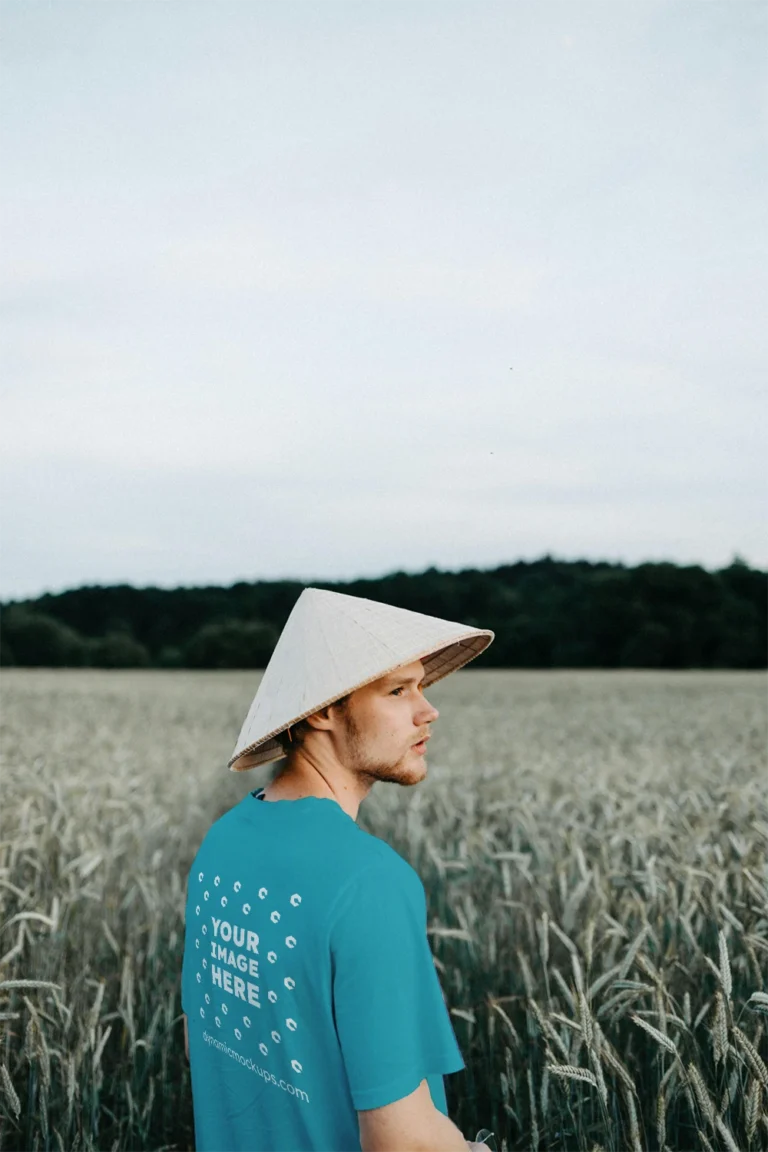 Man Wearing Teal T-shirt Mockup Front View Template