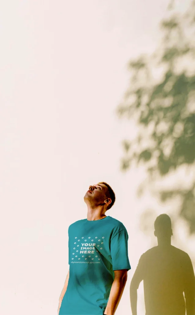 Man Wearing Teal T-shirt Mockup Front View Template