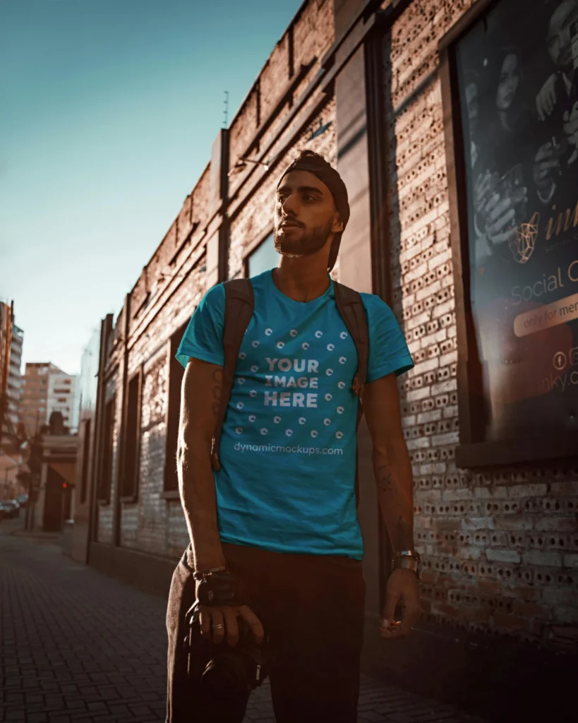 Man Wearing Teal T-shirt Mockup Front View Template