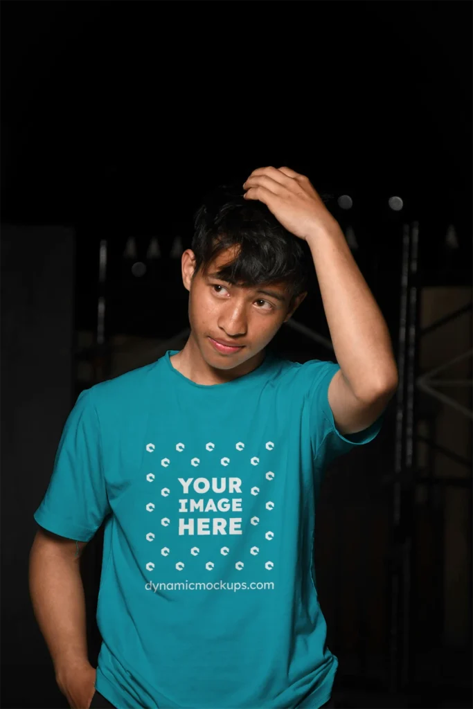 Man Wearing Teal T-shirt Mockup Front View Template