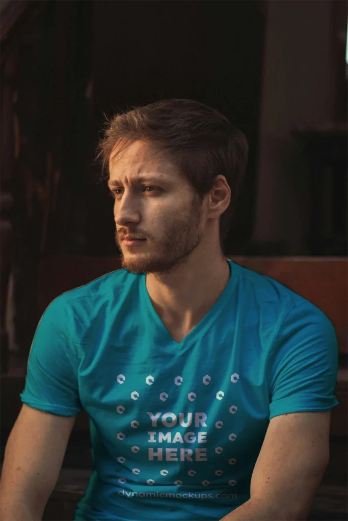 Man Wearing Teal T-shirt Mockup Front View Template