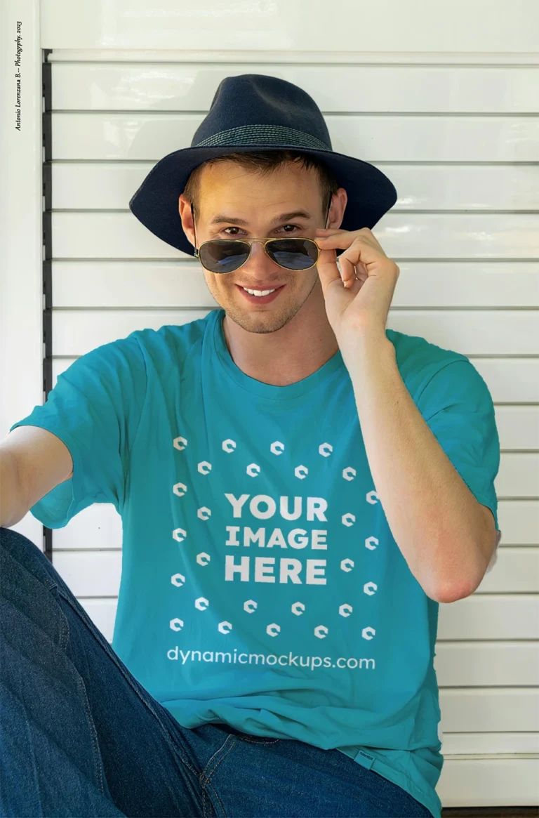 Man Wearing Teal T-shirt Mockup Front View Template