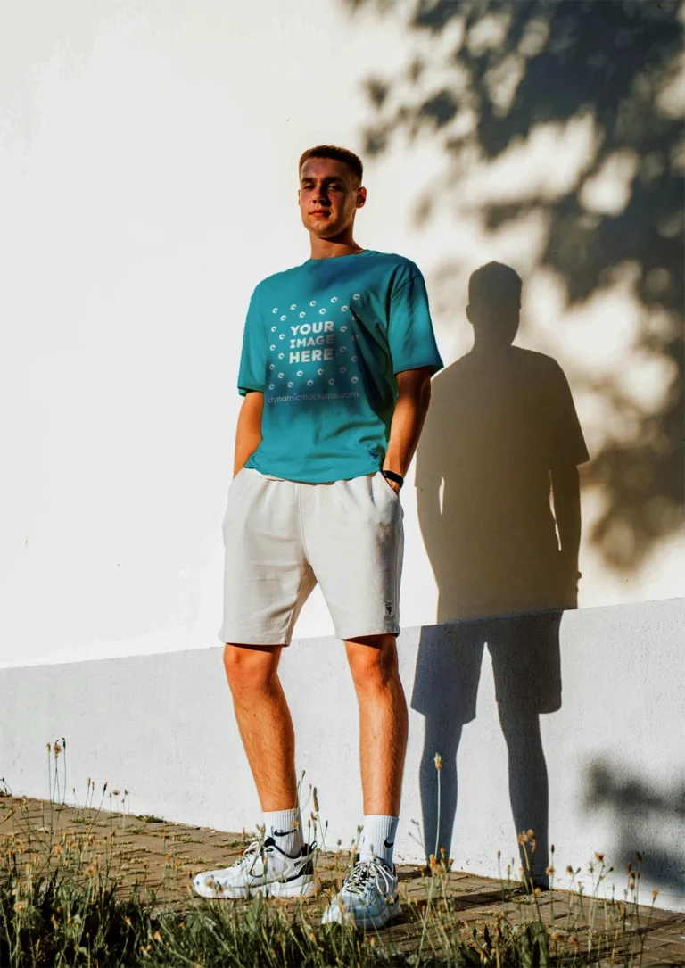 Man Wearing Teal T-shirt Mockup Front View Template