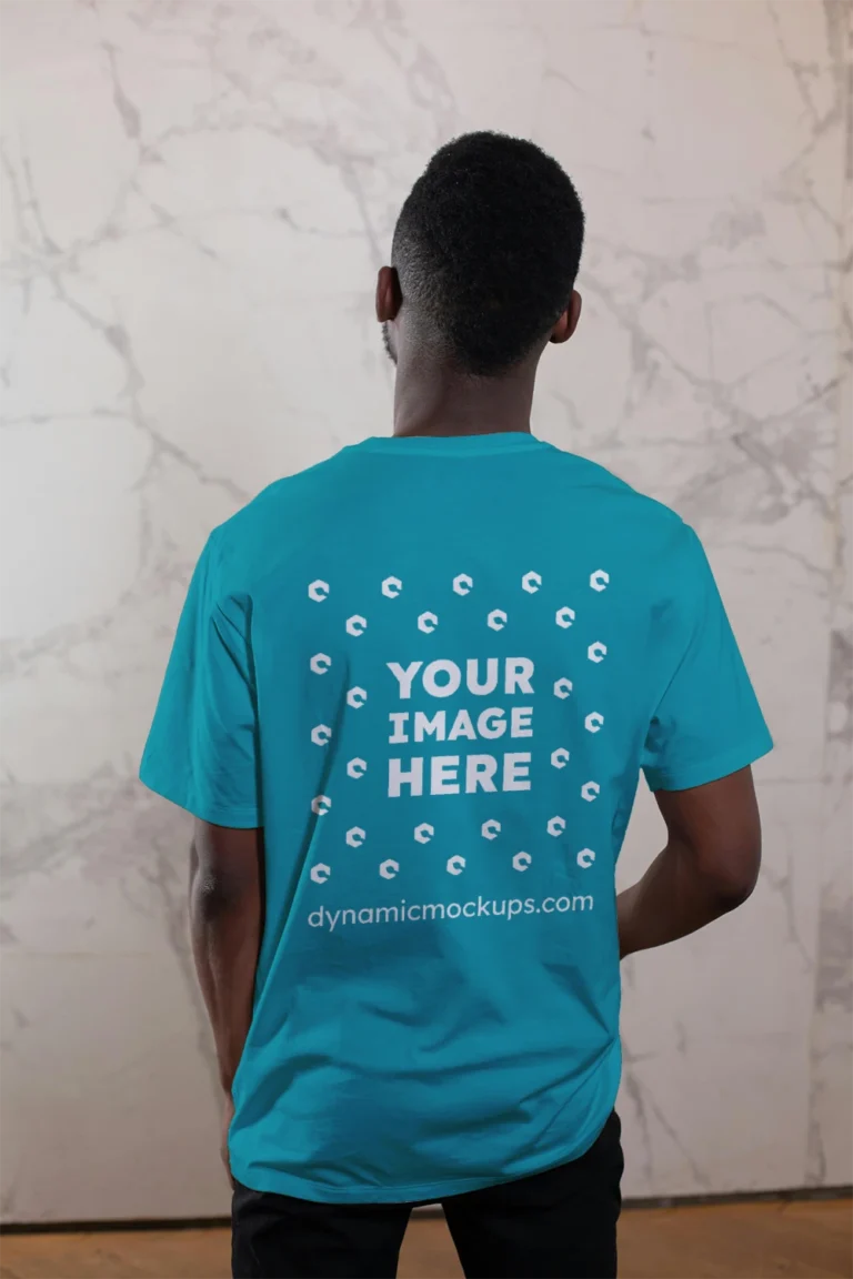 Man Wearing Teal T-shirt Mockup Back View Template