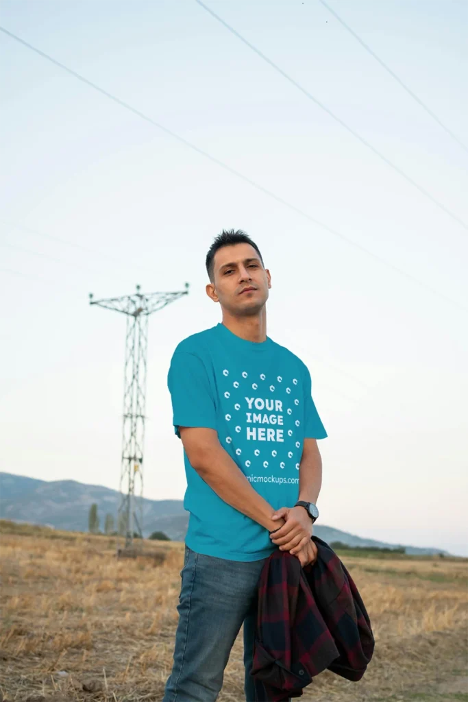 Man Wearing Teal T-shirt Mockup Front View Template