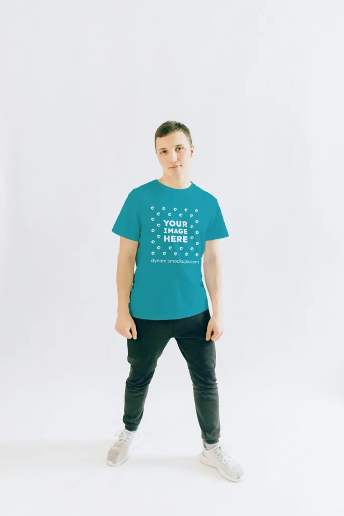 Man Wearing Teal T-shirt Mockup Front View Template