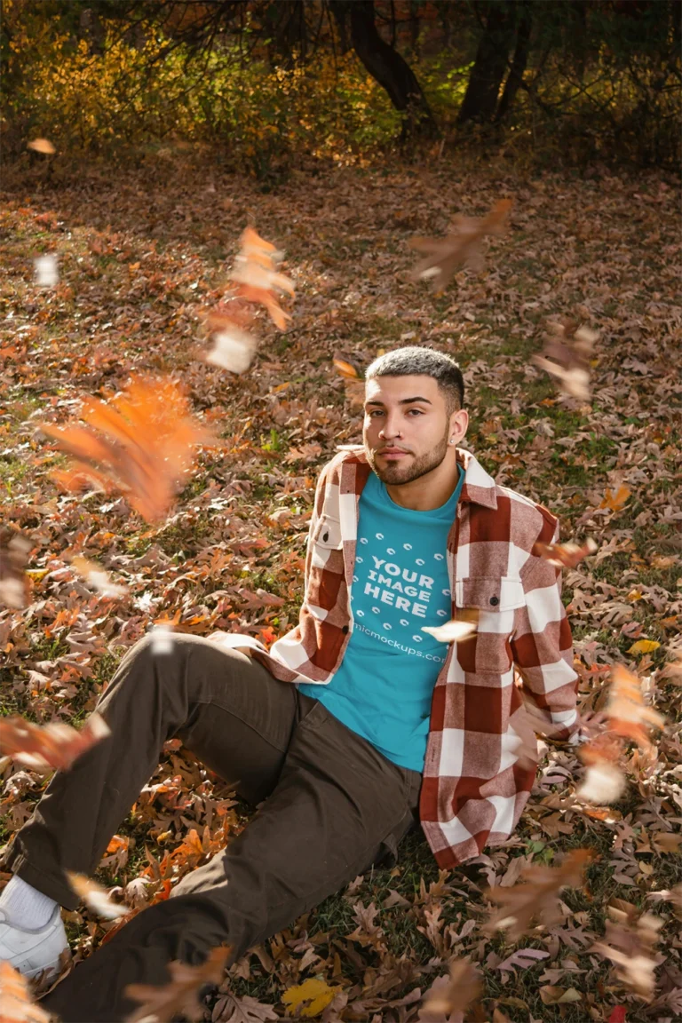 Man Wearing Teal T-shirt Mockup Front View Template