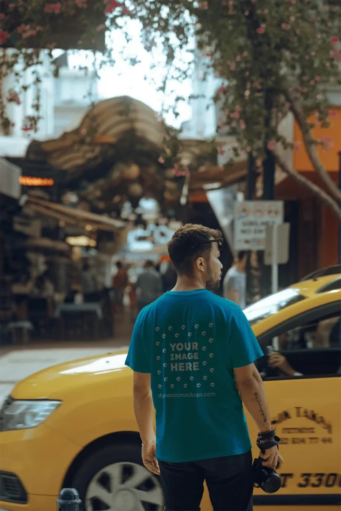 Man Wearing Teal T-shirt Mockup Back View Template