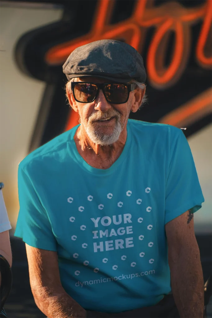 Man Wearing Teal T-shirt Mockup Front View Template