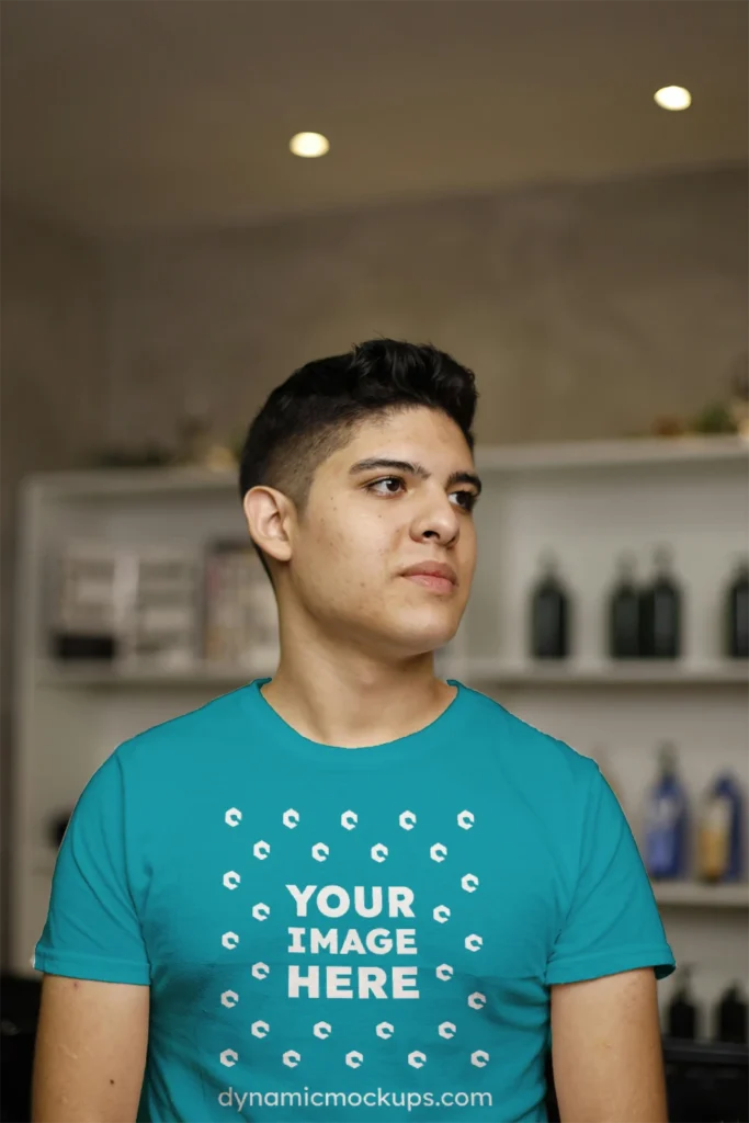 Man Wearing Teal T-shirt Mockup Front View Template