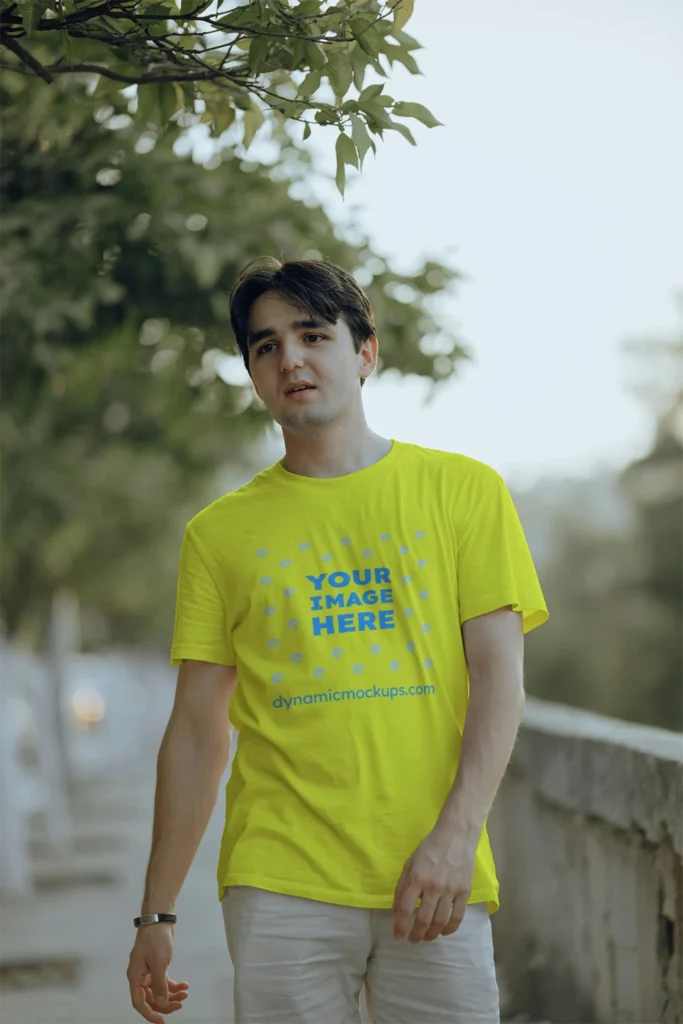 Man Wearing Yellow T-shirt Mockup Front View Template