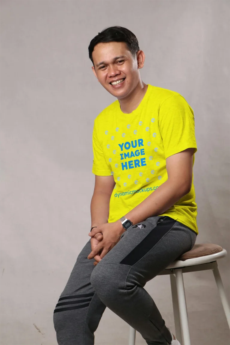 Man Wearing Yellow T-shirt Mockup Front View Template