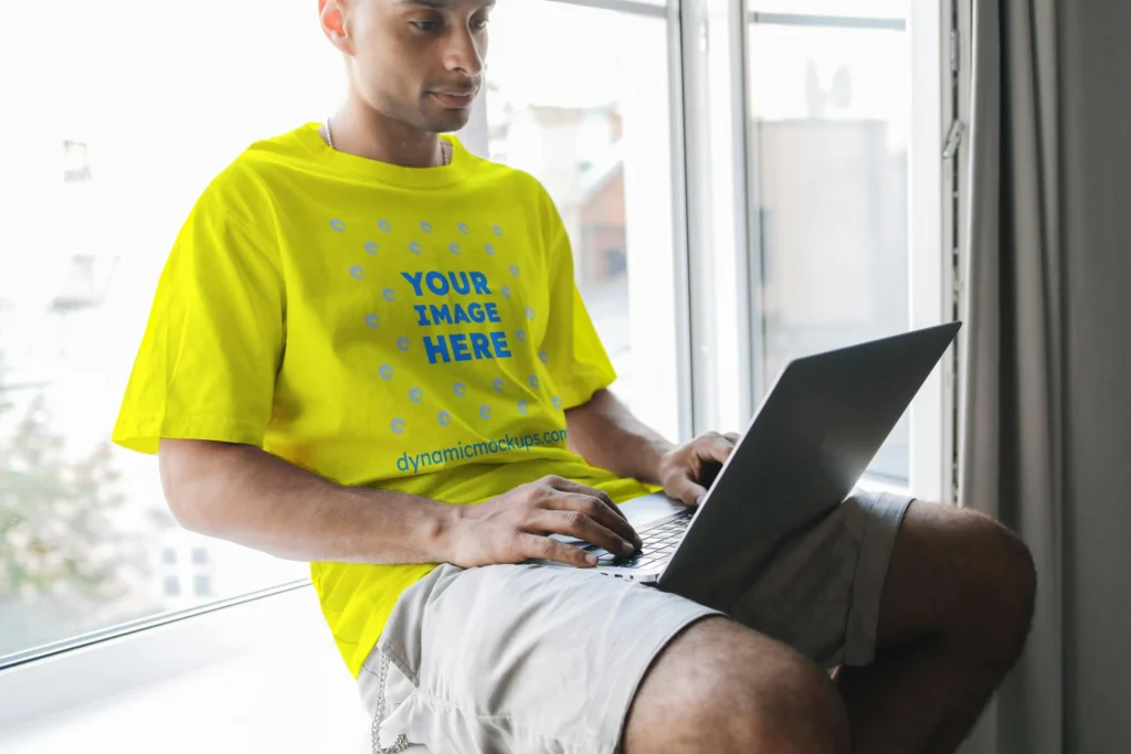 Man Wearing Yellow T-shirt Mockup Front View Template