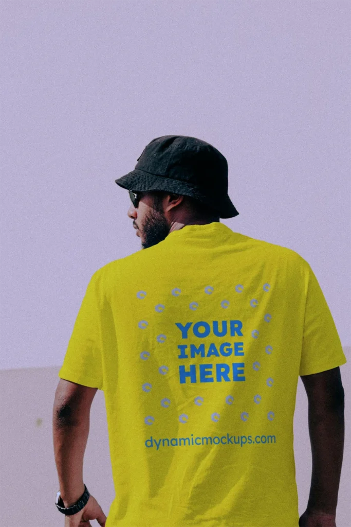 Man Wearing Yellow T-shirt Mockup Back View Template