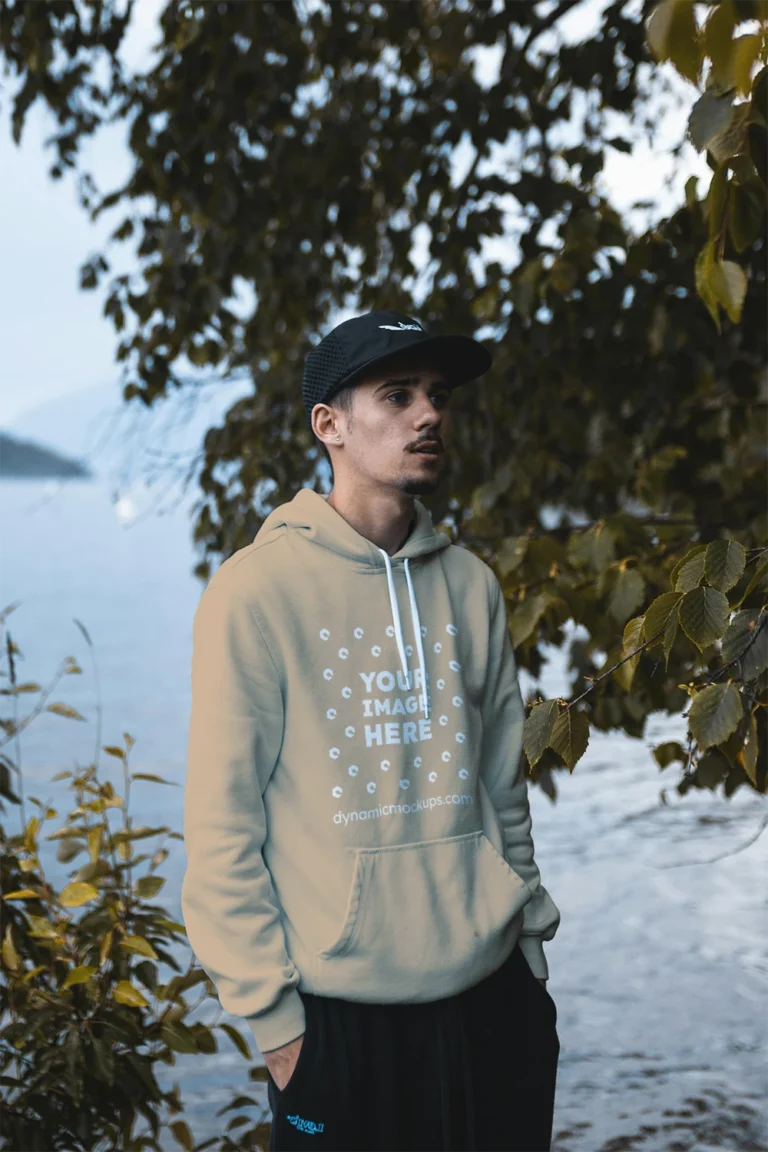 Man Wearing Beige Hoodie Mockup Front View Template