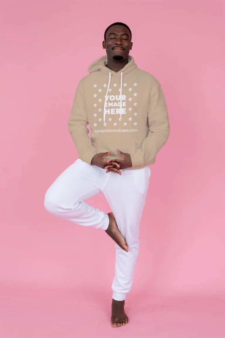 Man Wearing Beige Hoodie Mockup Front View Template