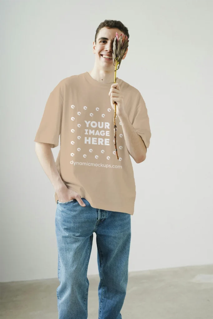 Man Wearing Beige T-shirt Mockup Front View Template