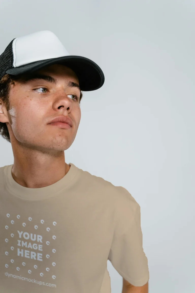 Man Wearing Beige T-shirt Mockup Front View Template
