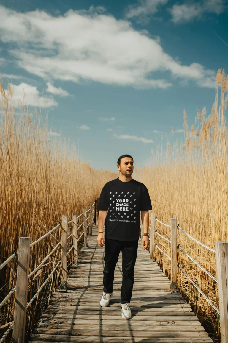 Man Wearing Black T-shirt Mockup Front View Template