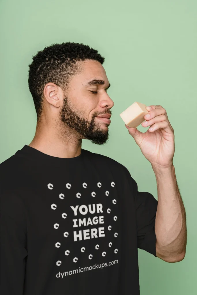Man Wearing Black T-shirt Mockup Front View Template