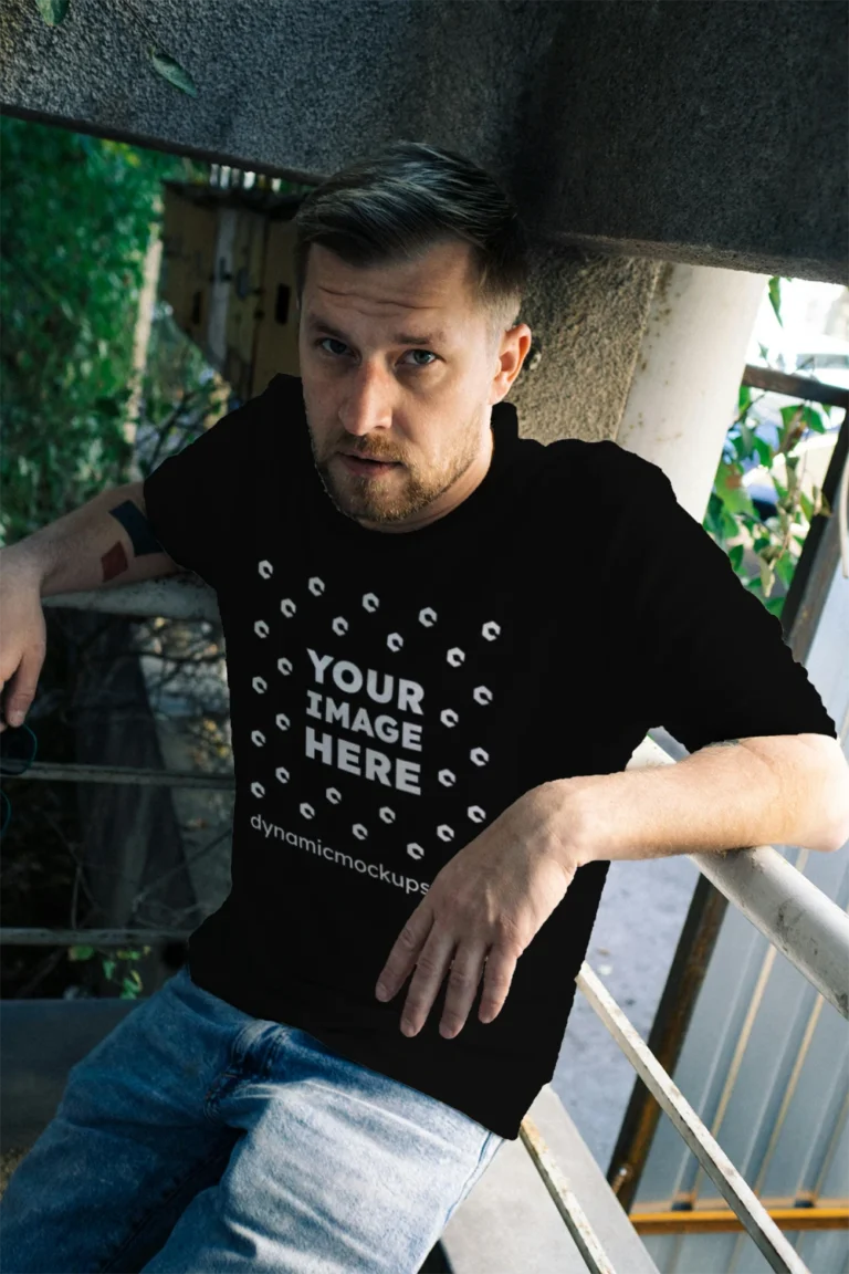 Man Wearing Black T-shirt Mockup Front View Template
