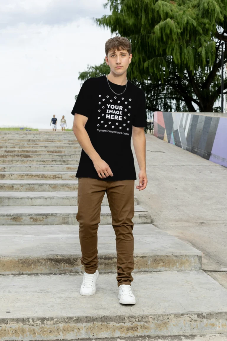 Man Wearing Black T-shirt Mockup Front View Template