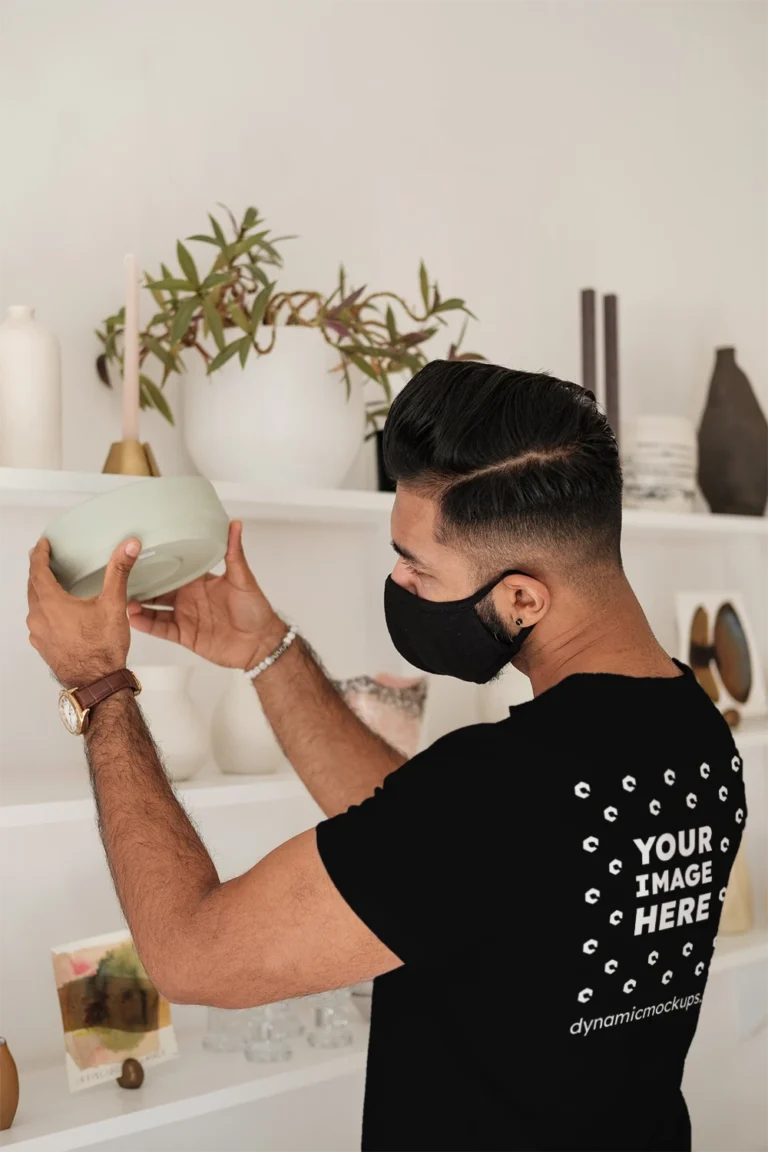 Man Wearing Black T-shirt Mockup Back View Template