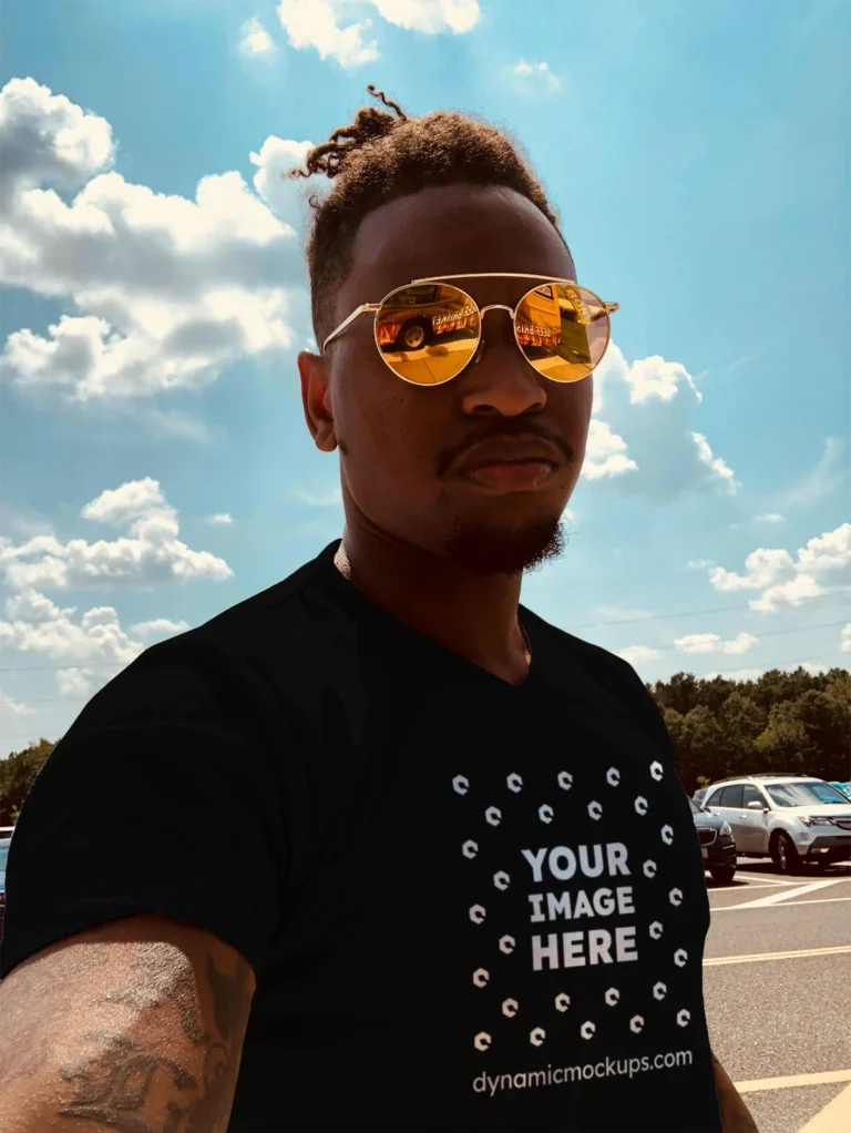 Man Wearing Black T-shirt Mockup Front View Template