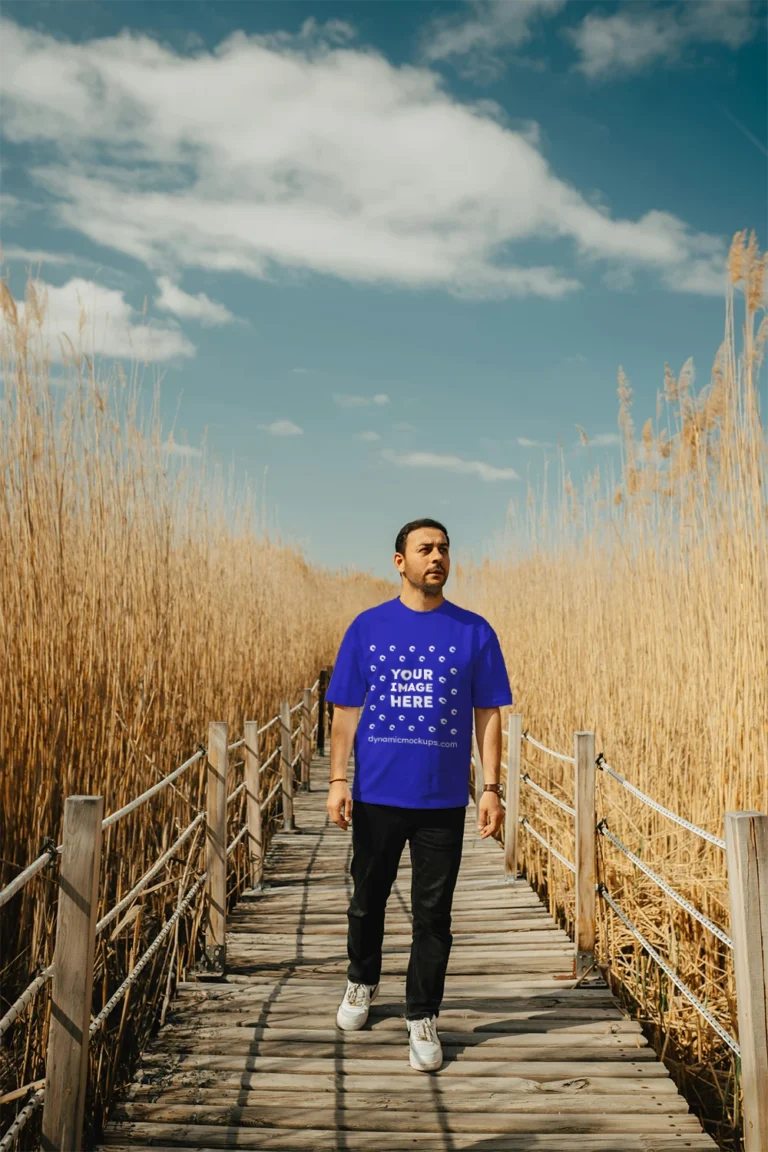 Man Wearing Blue T-shirt Mockup Front View Template