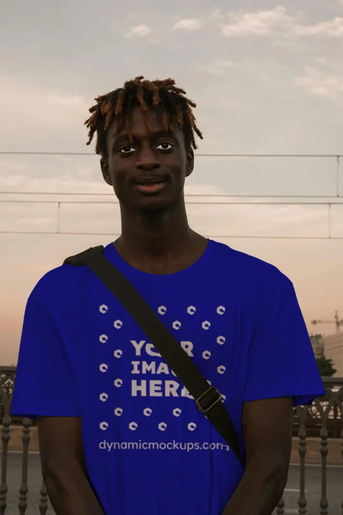 Man Wearing Blue T-shirt Mockup Front View Template