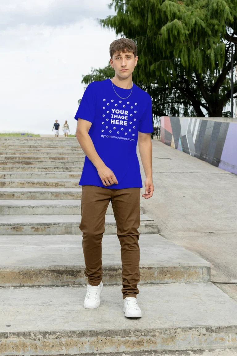 Man Wearing Blue T-shirt Mockup Front View Template
