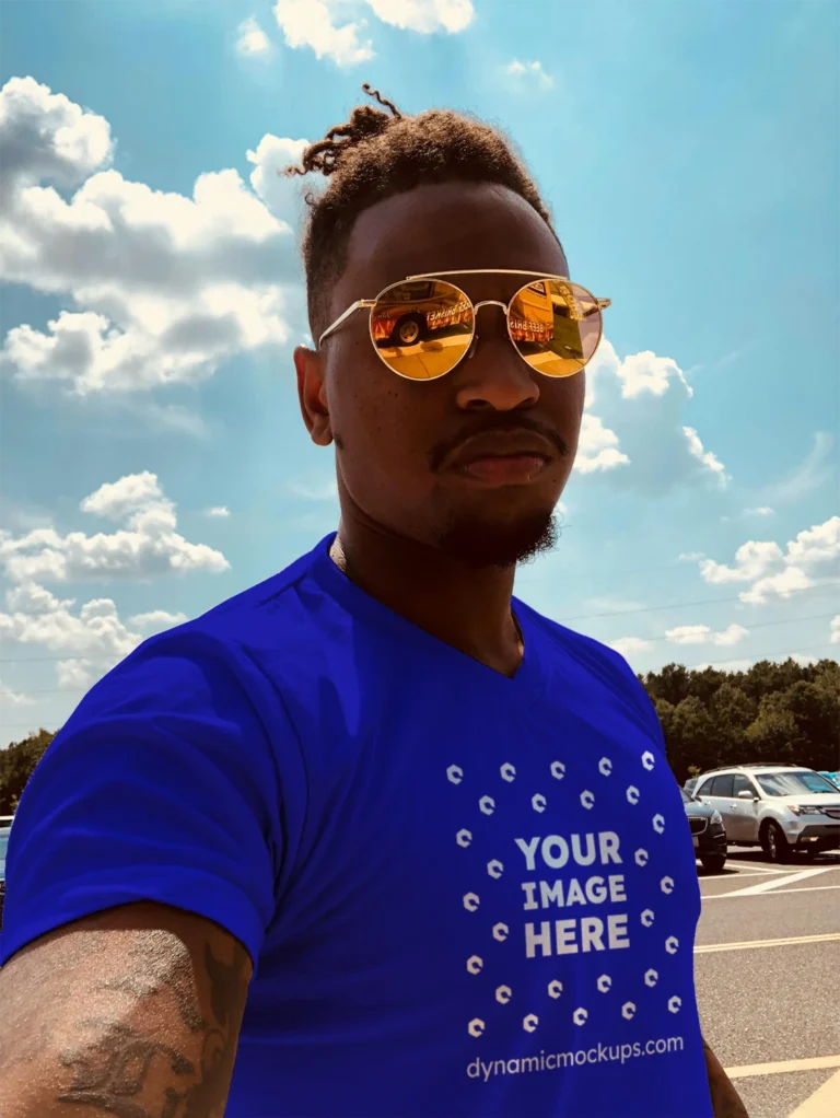 Man Wearing Blue T-shirt Mockup Front View Template