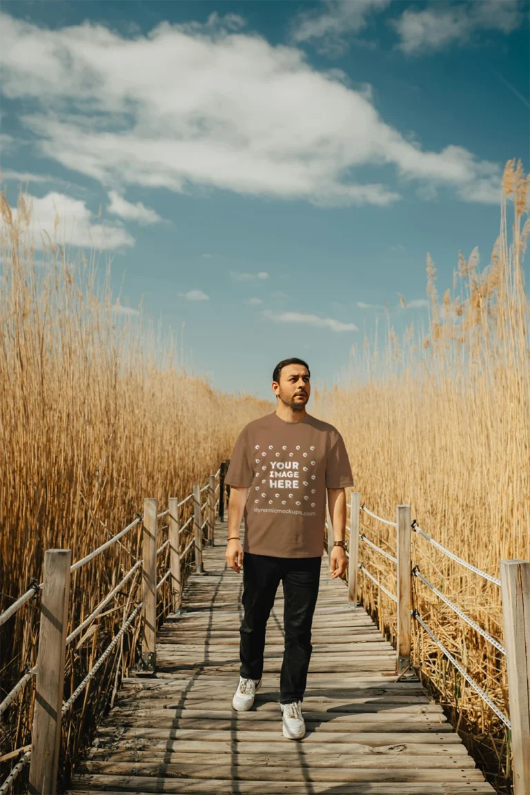 Man Wearing Brown T-shirt Mockup Front View Template