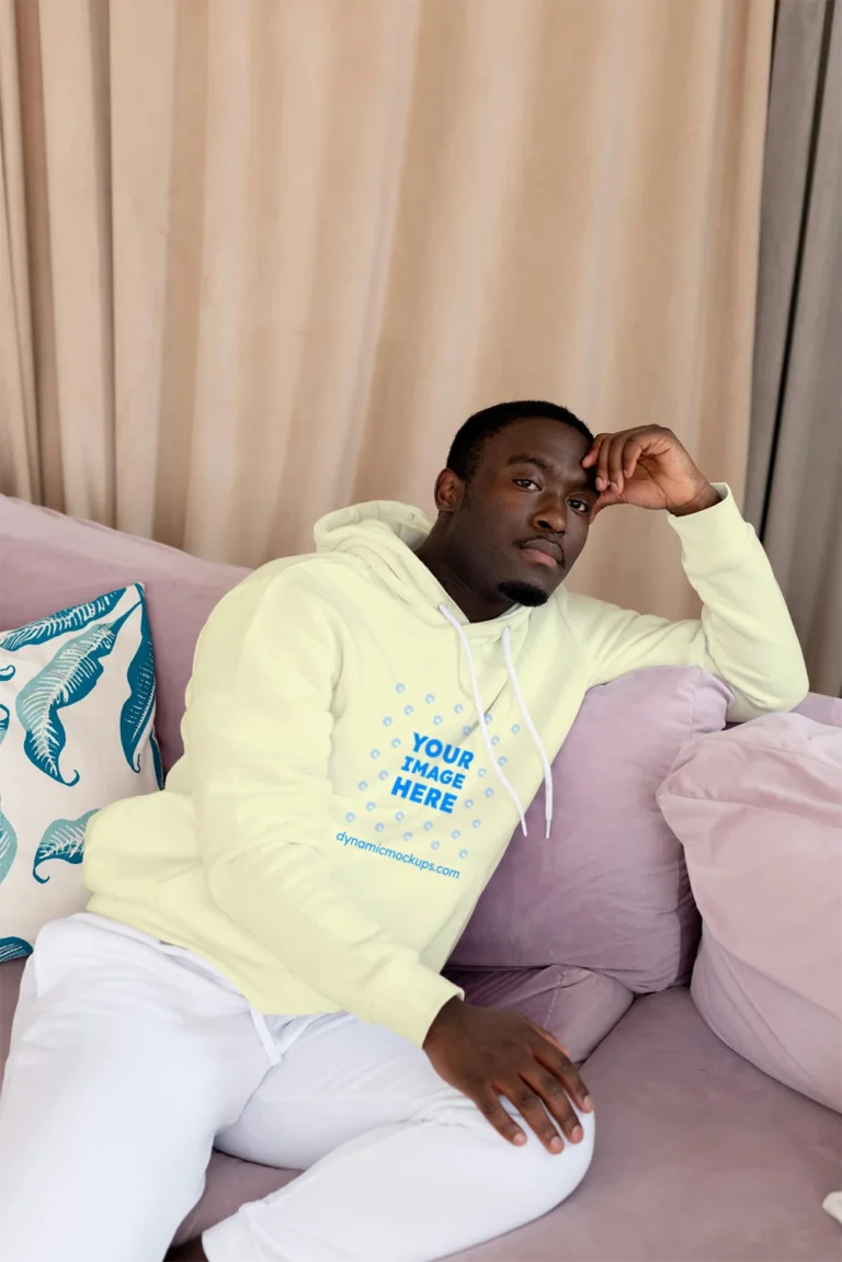 Man Wearing Cream Hoodie Mockup Front View Template