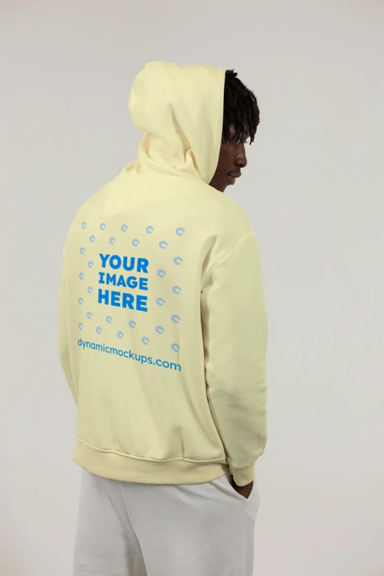 Man Wearing Cream Hoodie Mockup Back View Template