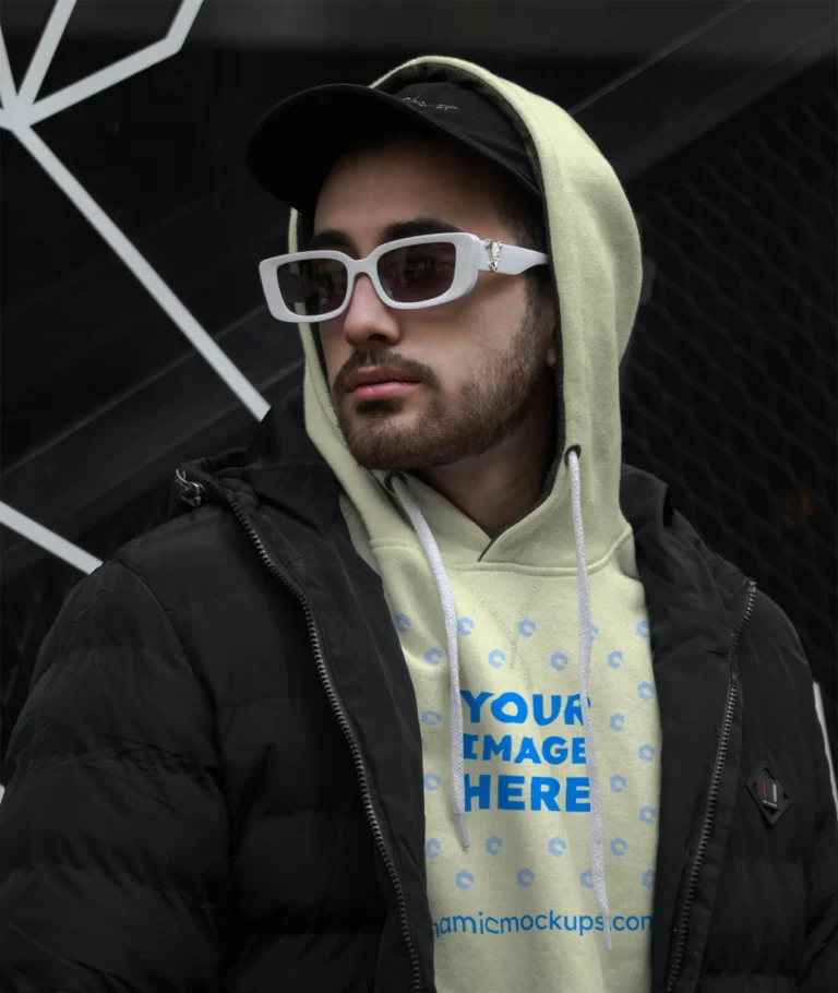 Man Wearing Cream Hoodie Mockup Front View Template