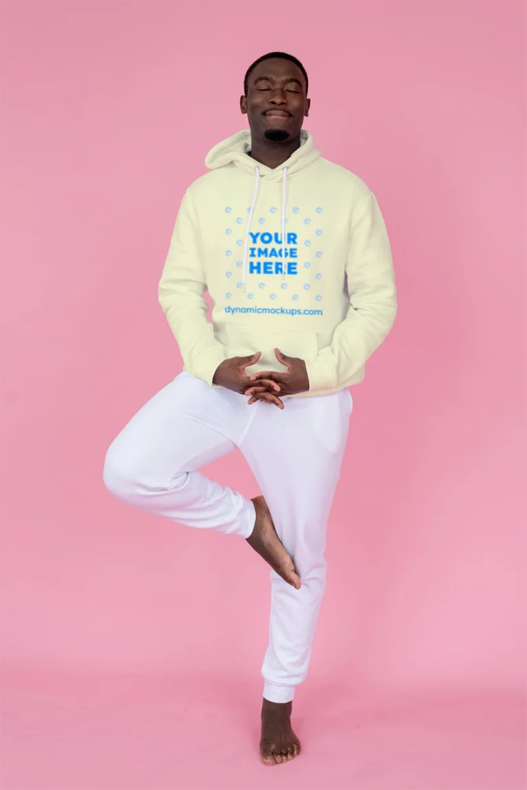 Man Wearing Cream Hoodie Mockup Front View Template