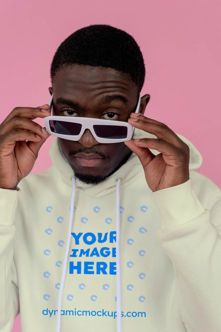 Man Wearing Cream Hoodie Mockup Front View Template
