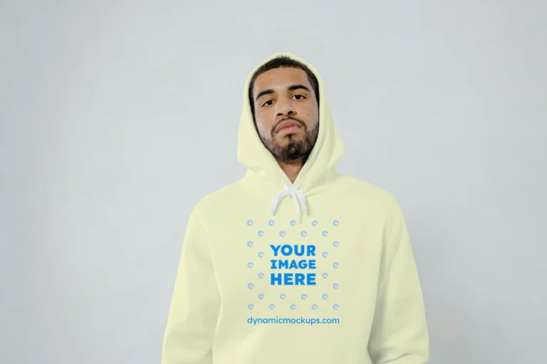Man Wearing Cream Hoodie Mockup Front View Template