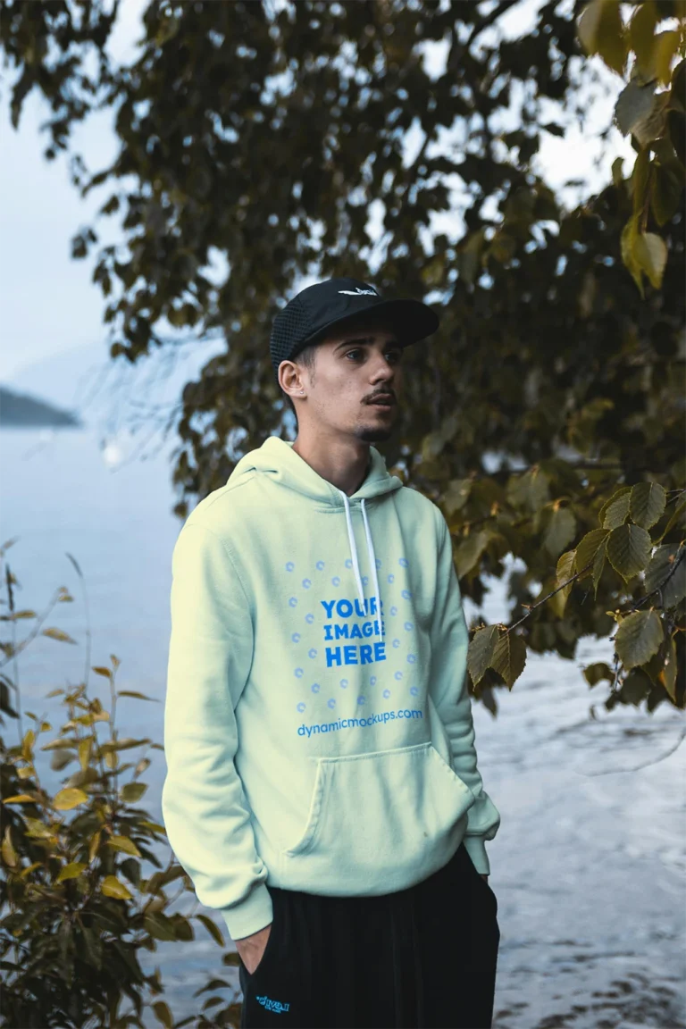 Man Wearing Cream Hoodie Mockup Front View Template
